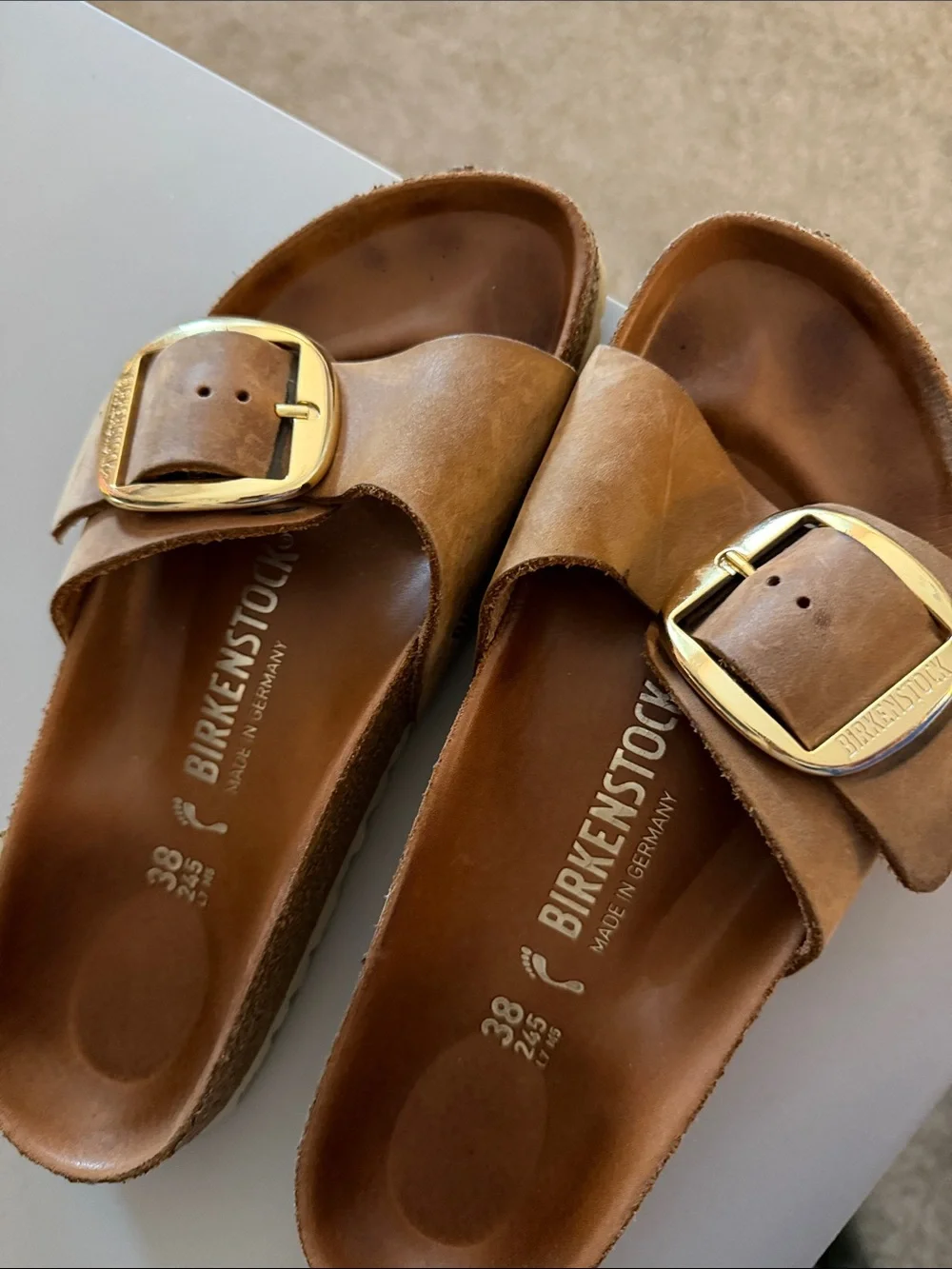 Birkenstock Tan Slide Sandals with Gold Buckles